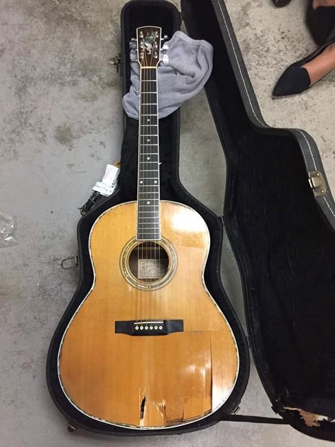 Musician mourns his vintage, handmade guitar stabbed by airport forklift | iNFOnews.ca Musician mourns his vintage, handmade guitar stabbed by airport forklift | iNFOnews.ca