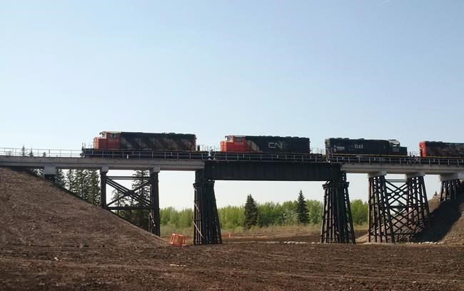 CN rebuilds train trestle in 20 days after arson fire destroys previous bridge | iNFOnews.ca