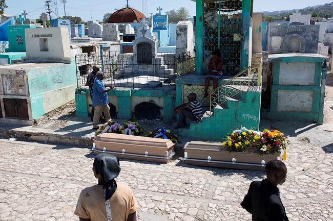 Mass funeral held for 20 Haitians who died in dismal prison | iNFOnews.ca