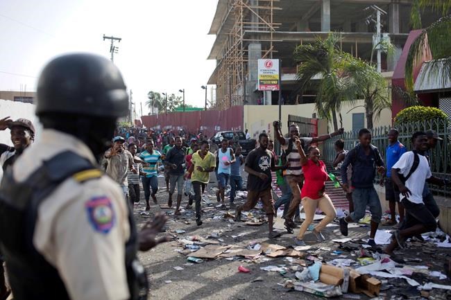 Looting follows violent fuel protests in Haitian capital | iNFOnews.ca