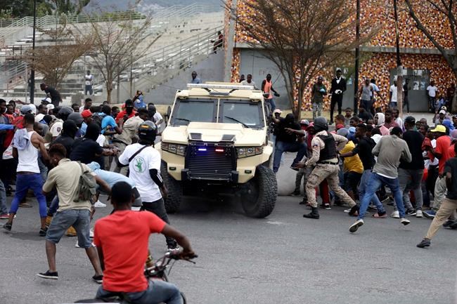 Haiti police exchange fire with troops near national palace | iNFOnews.ca