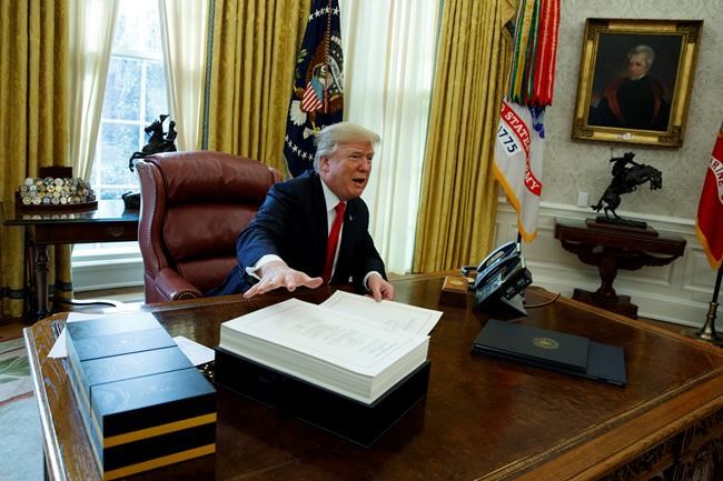 The Latest: Trump begins holiday after signing tax bill | iNFOnews.ca The Latest: Trump begins holiday after signing tax bill | iNFOnews.ca