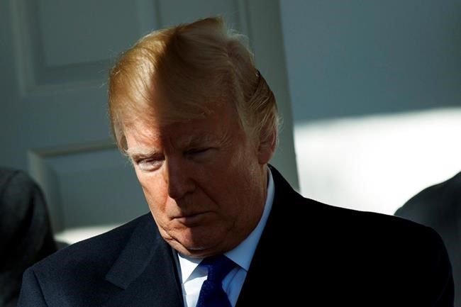 Trump signs surveillance law after confusing tweets | iNFOnews.ca
