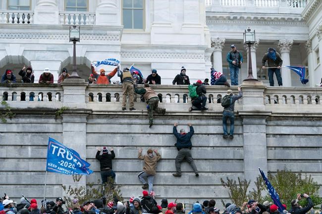 The Latest: Seattle probes officers about Washington rally | iNFOnews.ca