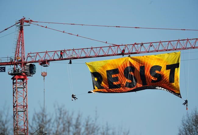 The Latest: Activists descending from crane near White House | iNFOnews.ca The Latest: Activists descending from crane near White House | iNFOnews.ca
