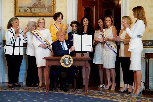 First lady opens student art exhibit on women's suffrage | iNFOnews.ca CP618399340