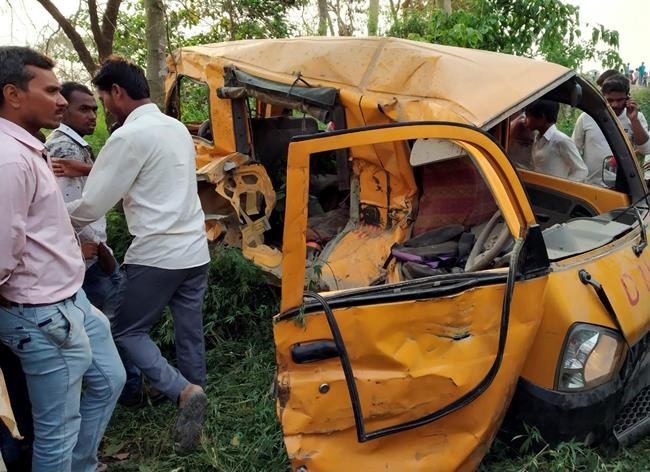 Train hits school van at India crossing, killing 12 children | iNFOnews.ca
