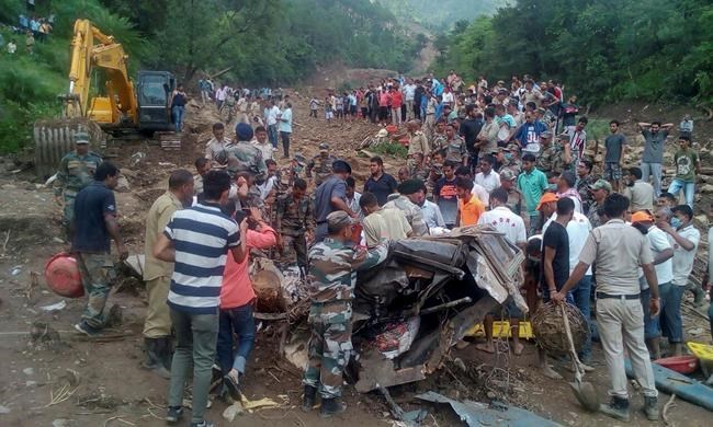 Rescuers pull out 13 bodies after landslide hits north India | iNFOnews.ca