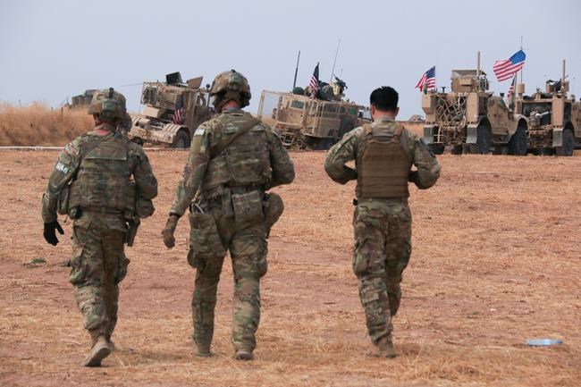 The Latest: Syrian Kurdish leader likens US move to genocide | iNFOnews.ca