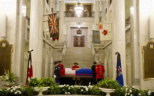 Two flags drape Lougheed's coffin as mourners pay respect at legislature | iNFOnews.ca CP20148141