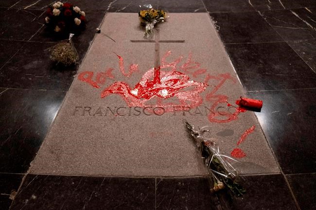 Spain: Artist arrested for red paint on late dictator's tomb | iNFOnews.ca