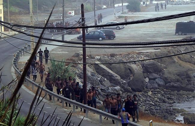 Over 150 migrants in Morocco climb fences to Spanish enclave | iNFOnews.ca