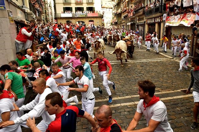 1 minor goring, 4 others injured in Spain's running of bulls | iNFOnews.ca CP297198163