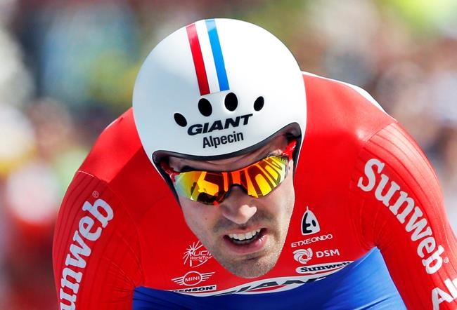 Froome wins mountain time trial, increases Tour lead | iNFOnews.ca