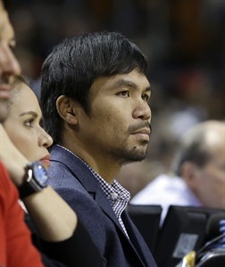 Let's get it on? Mayweather and Pacquiao courtside at Heat-Bucks game in Miami, share numbers | iNFOnews.ca