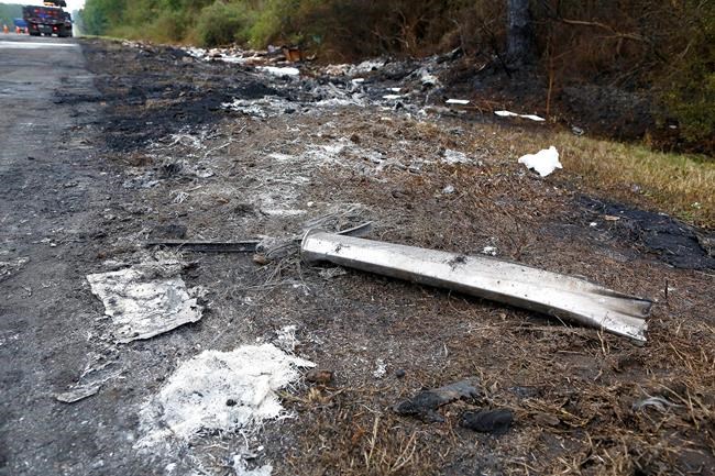 The Latest: Truck driver in fatal crash had several tickets | iNFOnews.ca