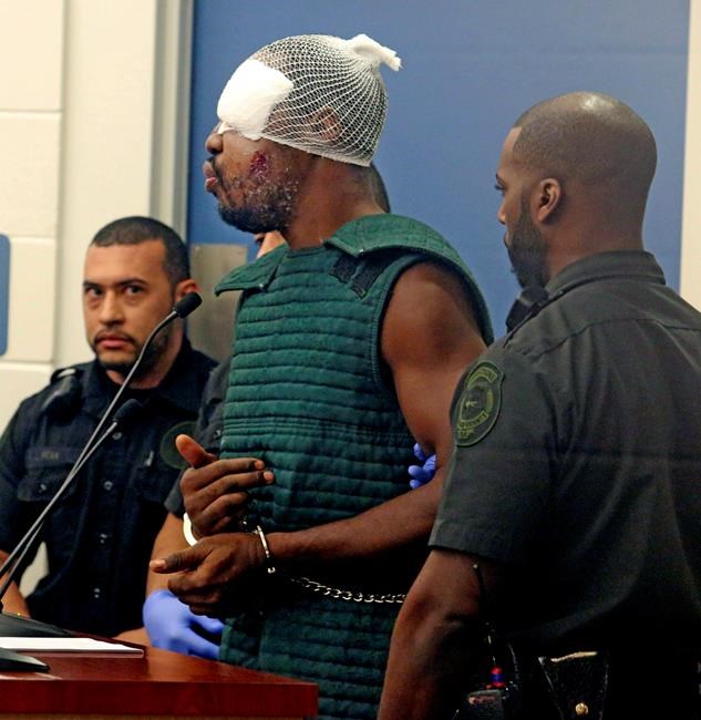 The Latest: Chief says suspect made sure officer was dead | iNFOnews.ca