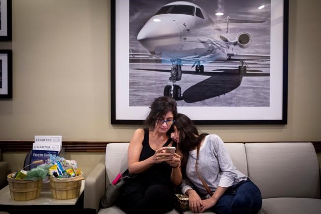 As Puerto Rico reels, lucky few get flights to the mainland | iNFOnews.ca As Puerto Rico reels, lucky few get flights to the mainland | iNFOnews.ca