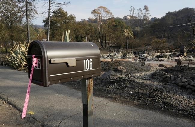 Older couples unable to escape wildfires embrace a last time | iNFOnews.ca CP295518193