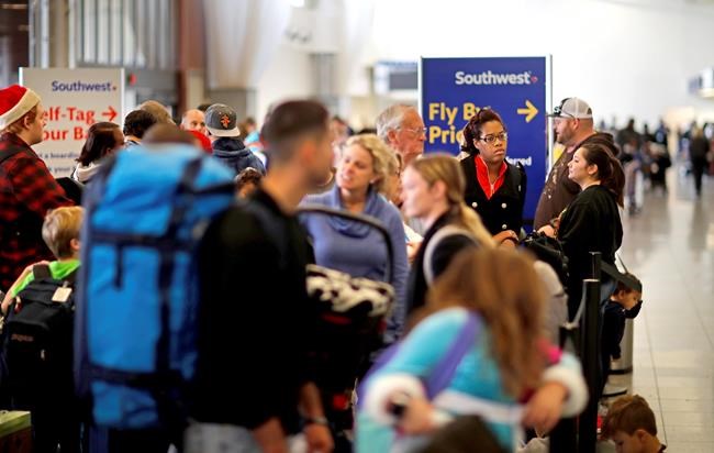 The Latest: Delta hopes to be mostly on schedule Tuesday | iNFOnews.ca CP1147337326