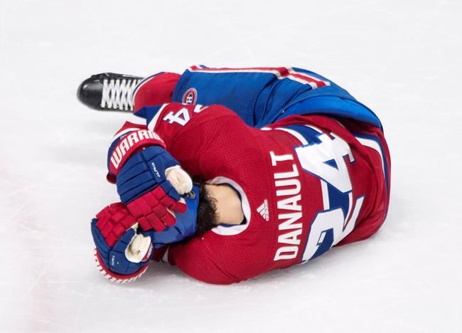 Canadiens' Danault taken off ice on stretcher after taking Chara shot to head | iNFOnews.ca