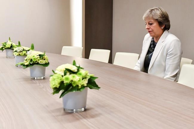 The Latest: EU chief brushes aside media reports on May | iNFOnews.ca