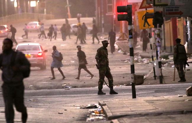 The Latest: Zimbabwe troops in Harare until 'situation over' | iNFOnews.ca The Latest: Zimbabwe troops in Harare until 'situation over' | iNFOnews.ca