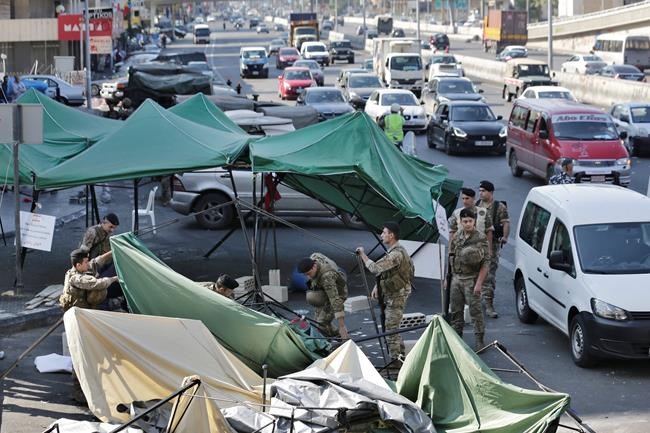 Lebanese army opens major roads after premier's resignation | iNFOnews.ca