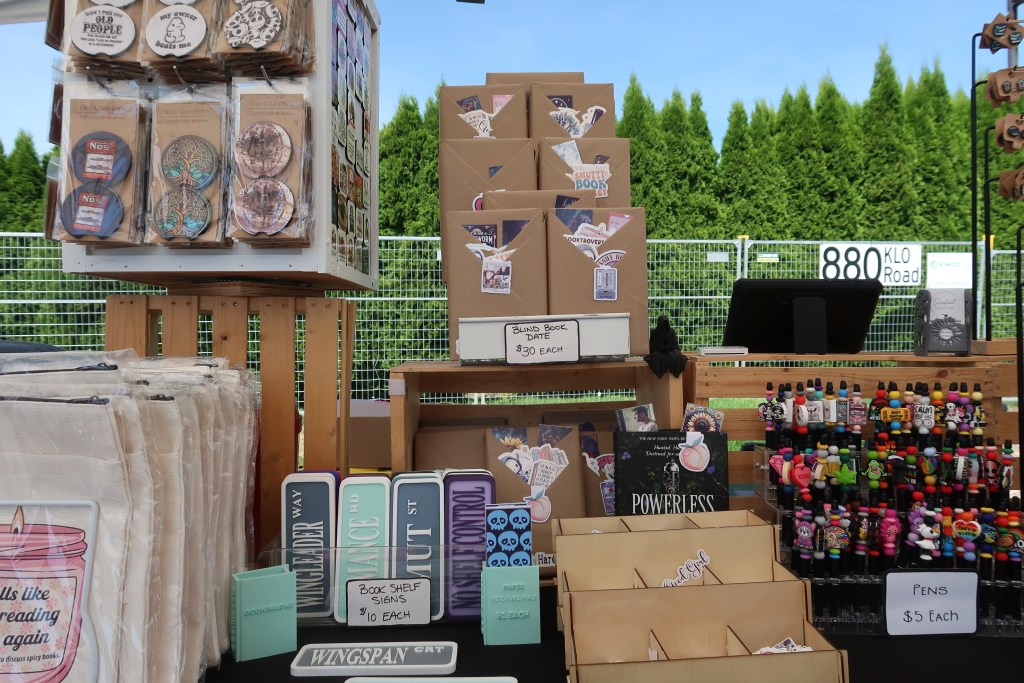 Seafoot Creation's display at the Charity Ride and Event, featuring their select 'blind date with a book' items.
