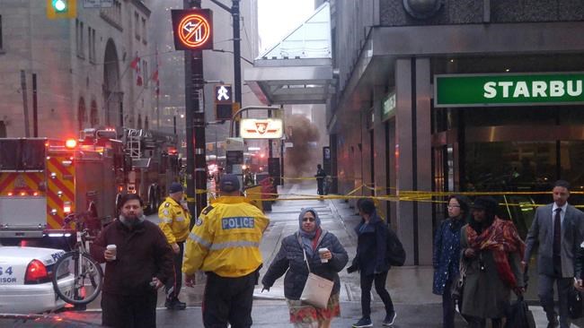 Police say explosions in downtown Toronto caused by hydro vault fire | iNFOnews.ca CP1133786509