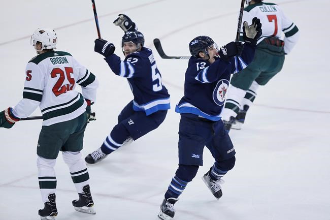 Hellebuyck makes 30 saves, Jets beat Wild in Game 5 to advance to Round 2 | iNFOnews.ca