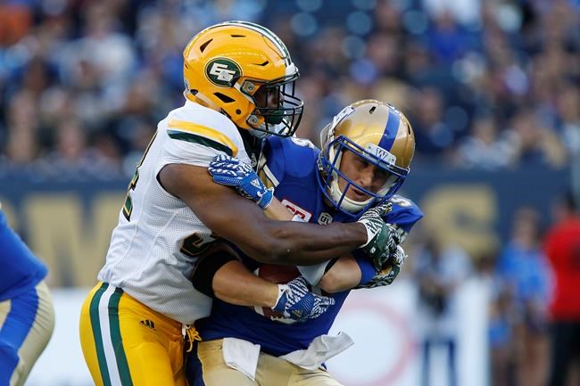 Reilly throws for 465 yards and two TDs, Eskimos come back to beat Bombers 20-16 | iNFOnews.ca