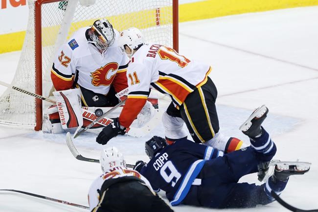Blake Wheeler's 90th point of season lifts Jets over Flames 2-1 | iNFOnews.ca Blake Wheeler's 90th point of season lifts Jets over Flames 2-1 | iNFOnews.ca