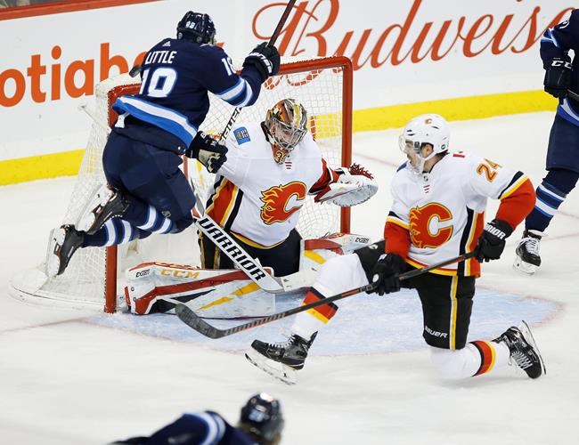 Gaudreau notches hat trick as Flames snap three-game skid with 4-1 win over Jets | iNFOnews.ca