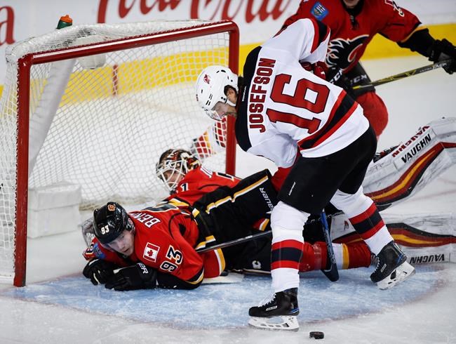 Kyle Palmieri scores, sets up another as Devils hold on to beat Flames 2-1 | iNFOnews.ca Kyle Palmieri scores, sets up another as Devils hold on to beat Flames 2-1 | iNFOnews.ca