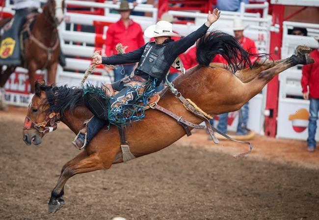 Alberta's Zeke Thurston scores saddle bronc hat trick at Calgary Stampede | iNFOnews.ca Alberta's Zeke Thurston scores saddle bronc hat trick at Calgary Stampede | iNFOnews.ca