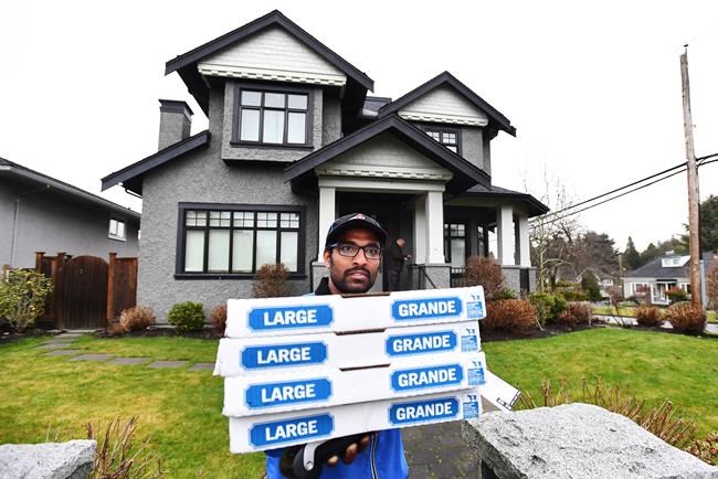 Pizza shared with media camped outside Vancouver home of Huawei CFO | iNFOnews.ca Pizza shared with media camped outside Vancouver home of Huawei CFO | iNFOnews.ca