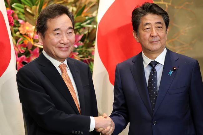 Abe, S. Korean premier agree to keep talking to mend ties | iNFOnews.ca