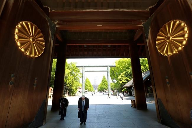 Japan's Suga makes offering at war shrine but doesn't visit | iNFOnews.ca