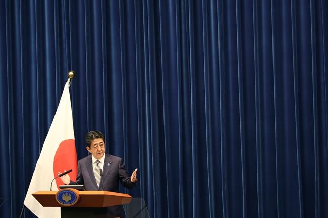 Japan PM Abe says visit by Iran's Rouhani being arranged | iNFOnews.ca CP1136653064