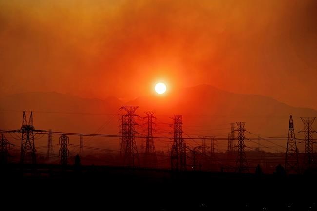 Los Angeles fire began under power lines, cause not known | iNFOnews.ca