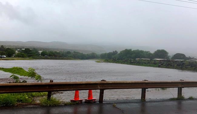 Tropical storm fades but still douses Hawaii with rain | iNFOnews.ca