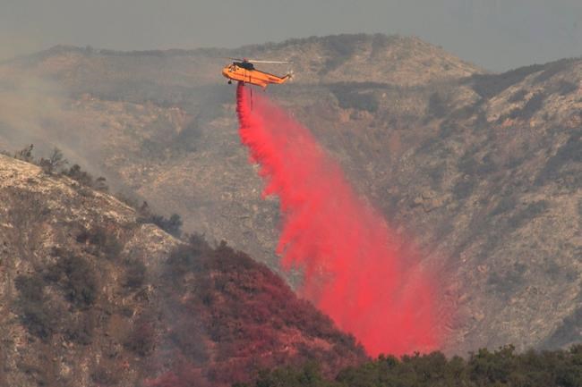 The Latest: Fire northwest of LA has burned 418 square miles | iNFOnews.ca