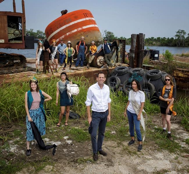 Louisiana orchestra performs on moving boats on a lake | iNFOnews.ca CP684680316