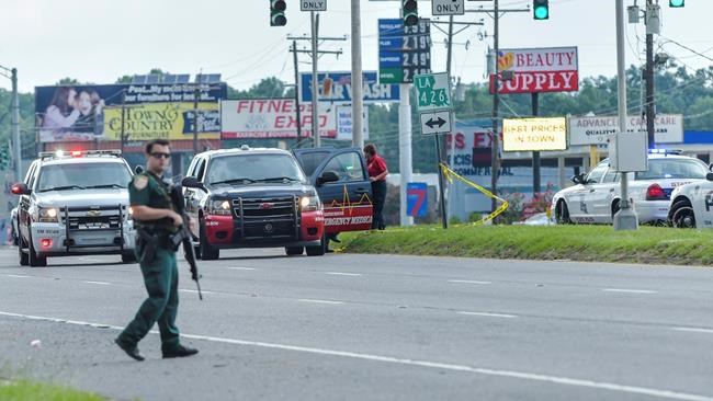 The Latest: Graphic, videos detail Baton Rouge police ambush | iNFOnews.ca