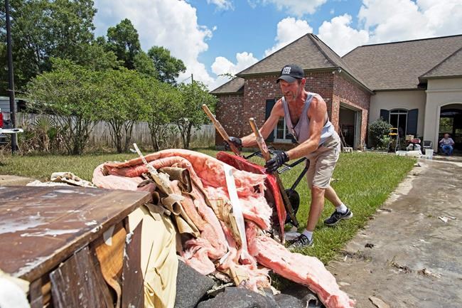 Long, hard recovery slog begins in flood-ravaged Louisiana | iNFOnews.ca CP663334419