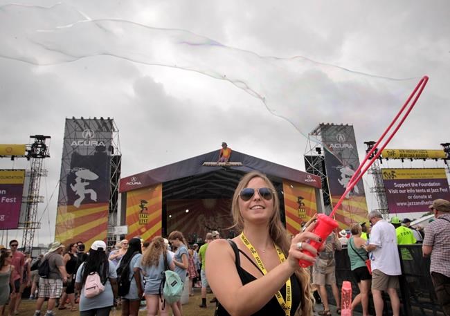 Start of 2nd weekend of Jazz Fest soaked by rain | iNFOnews.ca