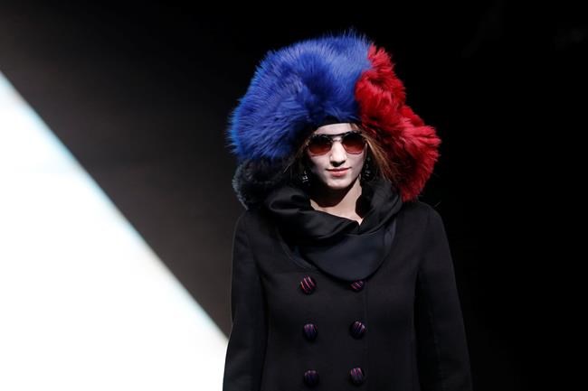 Armani rejects overdone emotion, Ferragamo favourscolour | iNFOnews.ca
