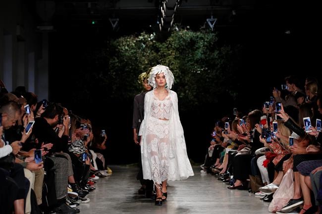 Chanel waterfall, Vuitton VIPs vie for attention in Paris | iNFOnews.ca