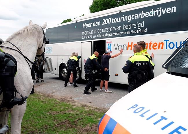 Dutch police arrest 400 after virus protest turns violent | iNFOnews.ca